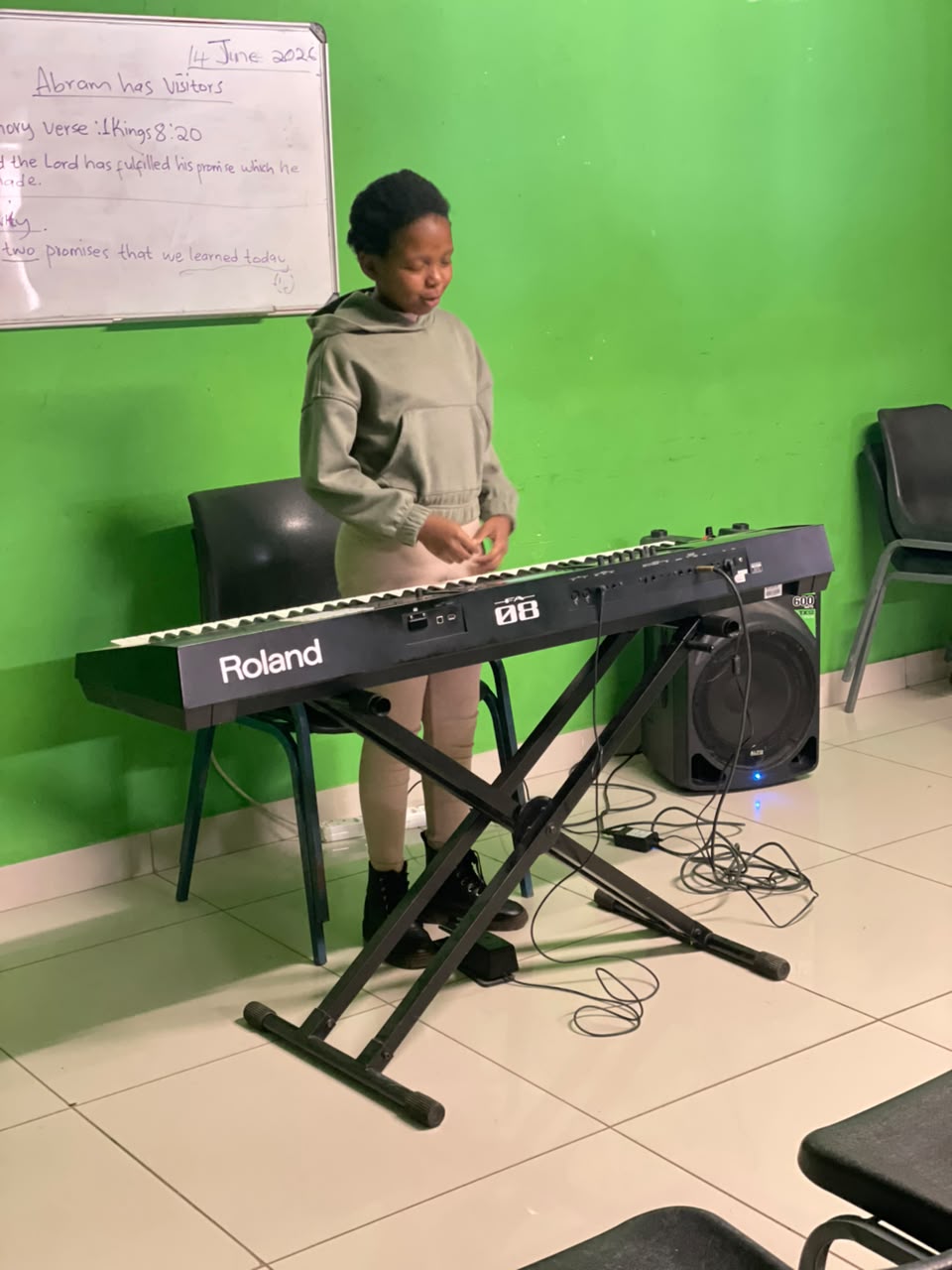 A young student takes the keys.